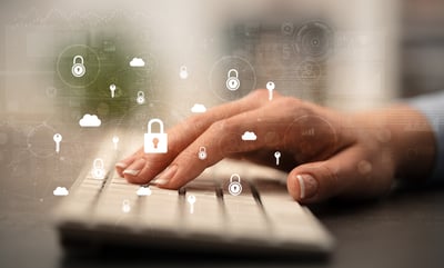 Business woman hand typing on keyboard with secured lock concept around Business woman hand typing on keyboard with secured lock concept around
