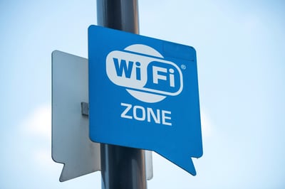 Wireless internet sign on pole on the street Wireless internet sign on pole on the street